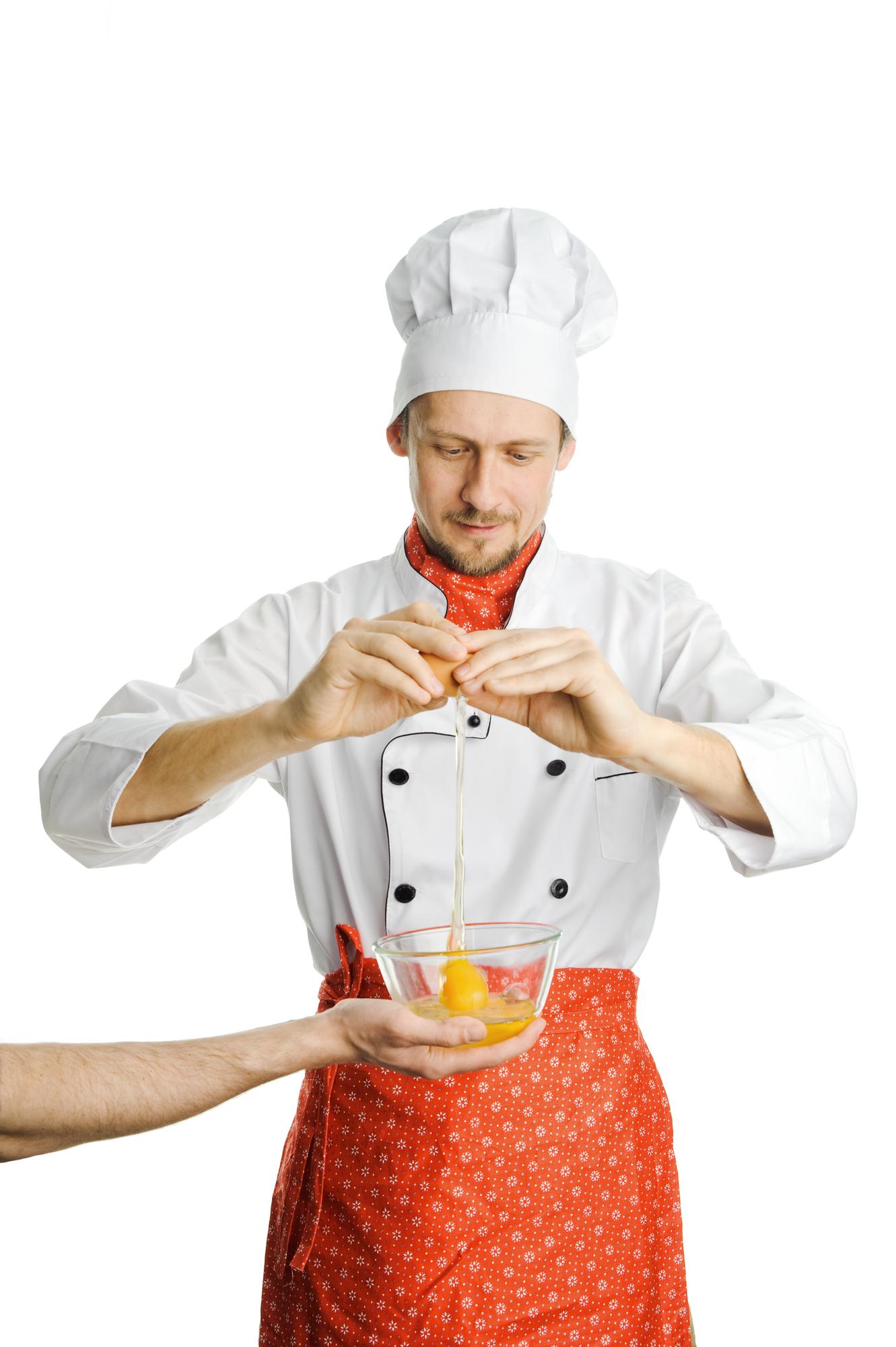Chef explaining plating to a student